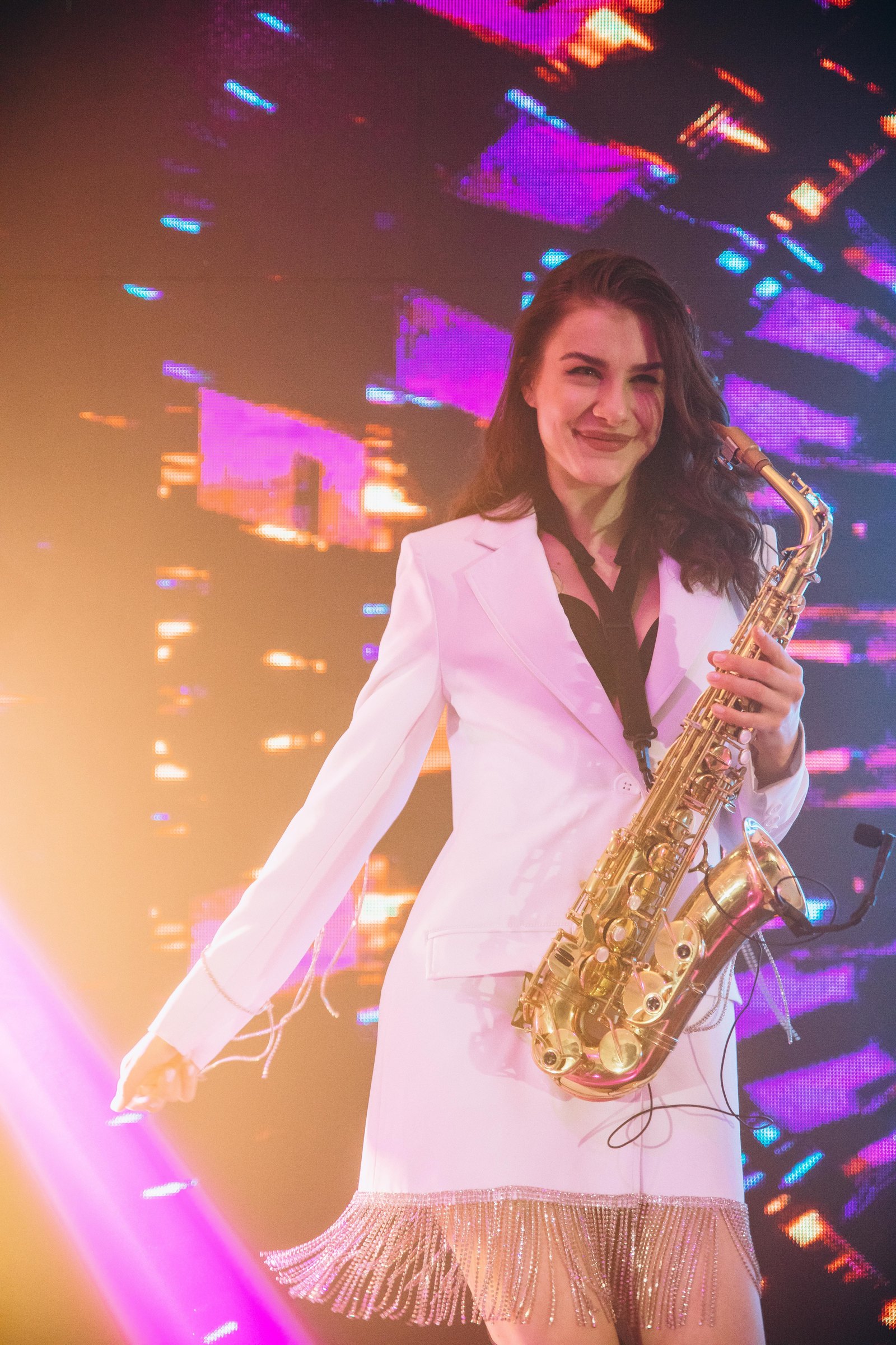 Studio portrait with saxophone and decks